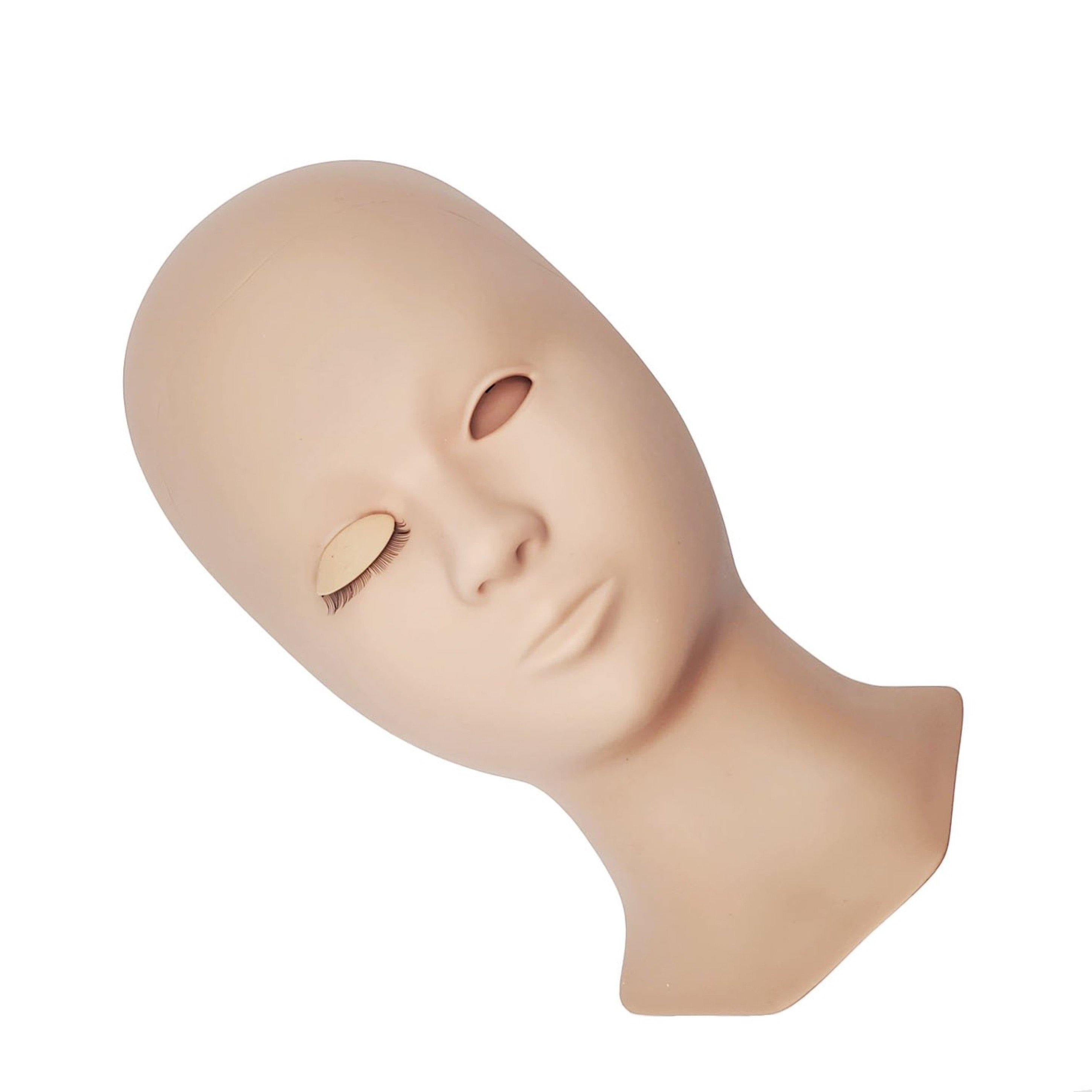 Mannequin head with removable eyelid